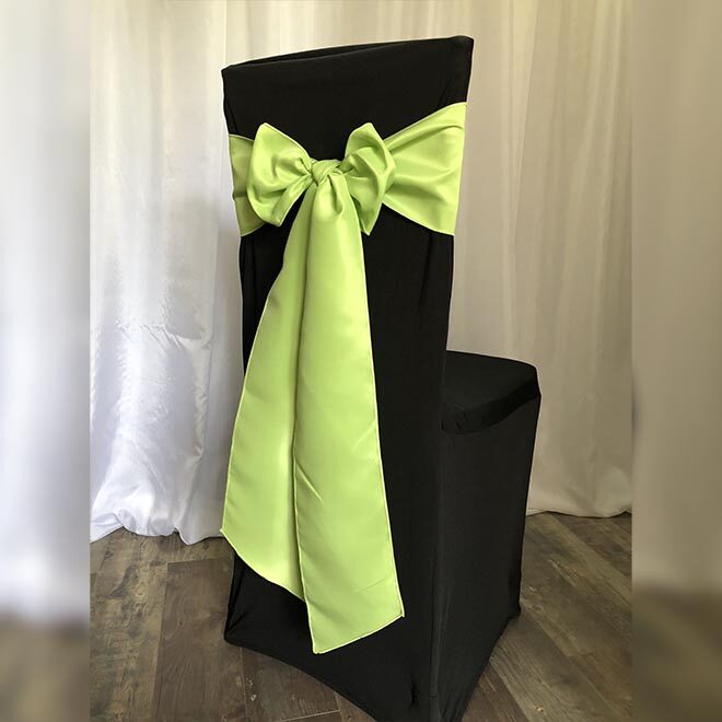 Világos zöld szatén-selyem masnival bérelhető fekete spandex székszoknyával